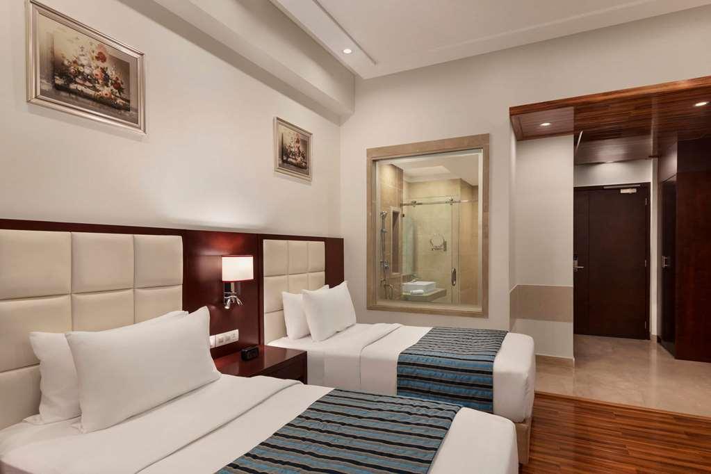 Ramada By Wyndham New Delhi Pitampura Hotell Rom bilde